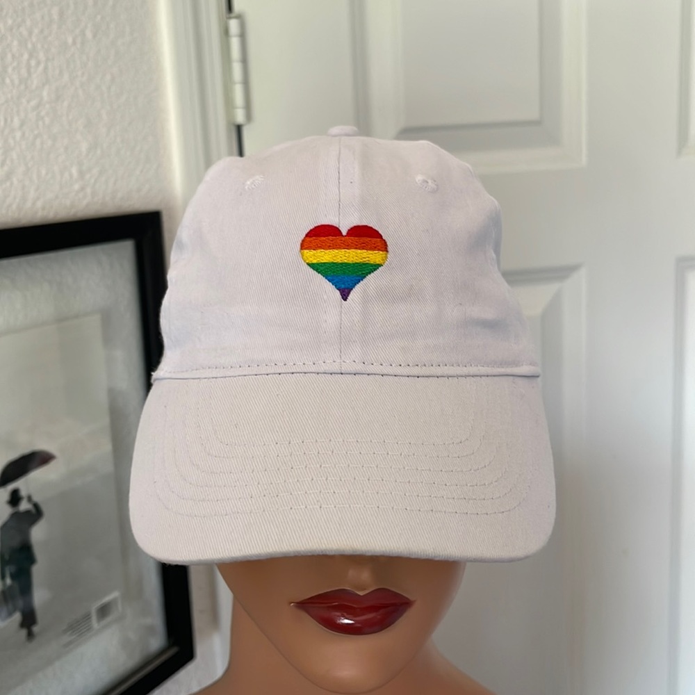 LIKE NEW PRIDE “HEART” BASEBALL CAP. Bright white. Velcro adjustable. EXCELLENT!
